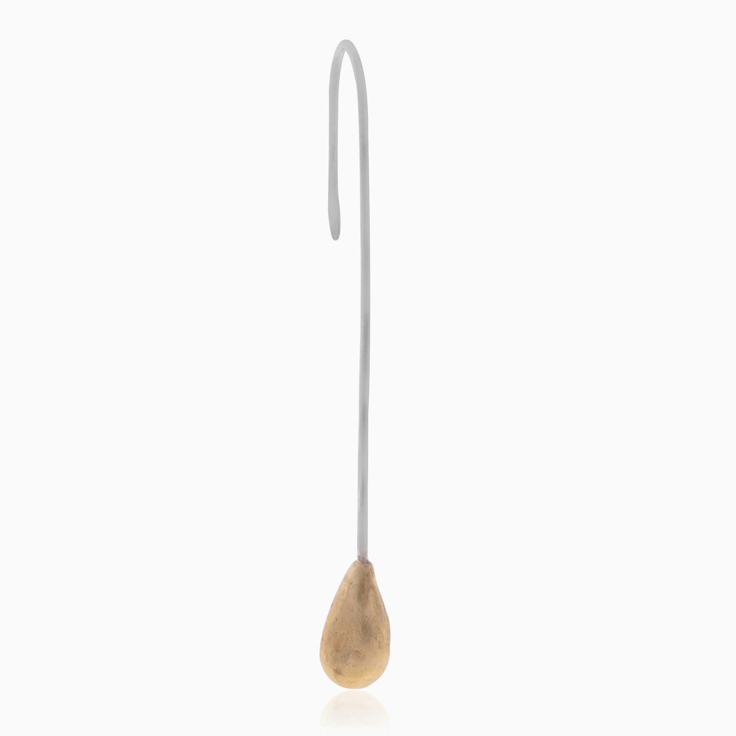 The Golden Drop Long Earring, handmade by Angela Lago, features a curved metal design with a teardrop-shaped wooden tip and is displayed against a white background.