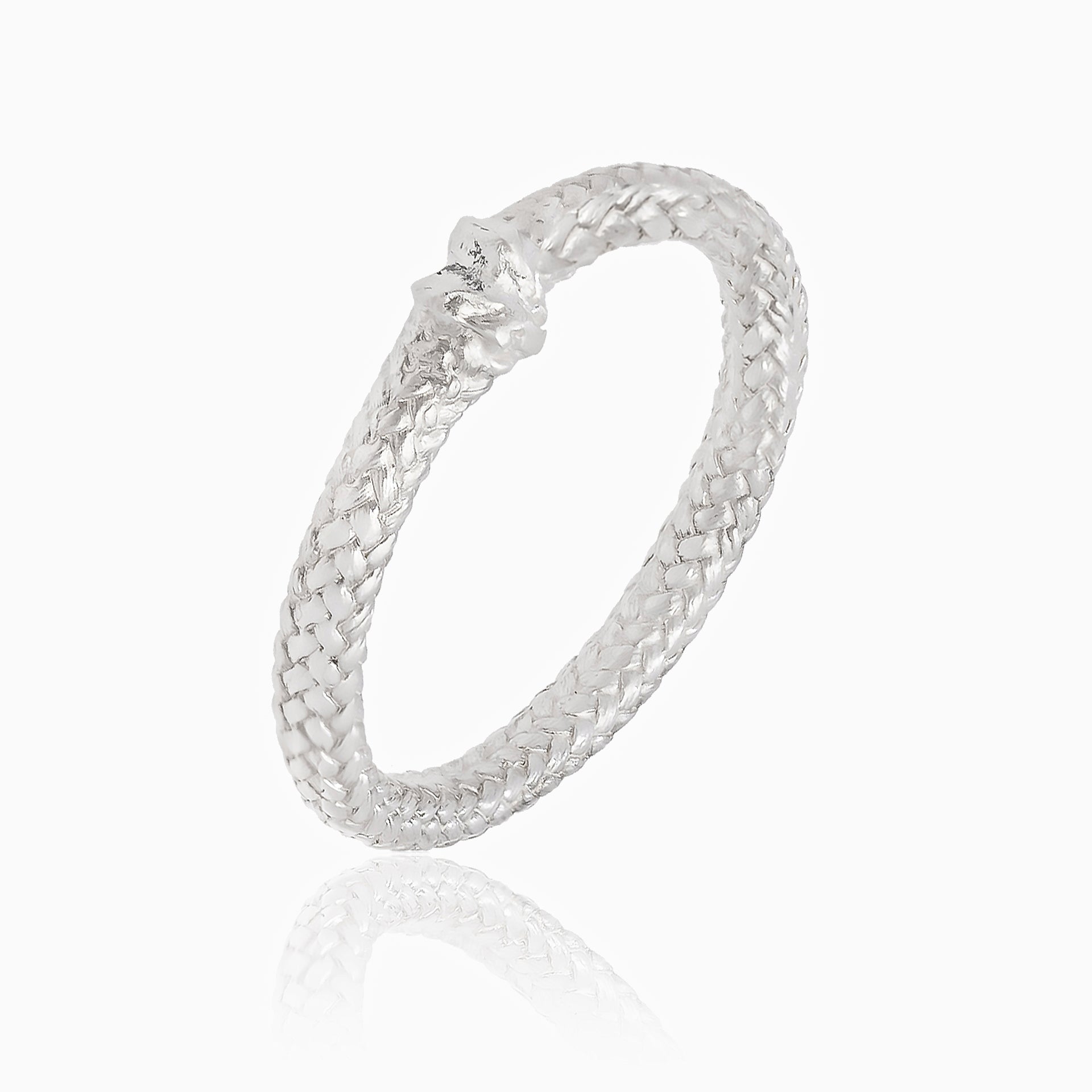 Introducing the Just a Nautical Handcrafted Rope Ring Inspired by Sailors, a sterling silver ring featuring an intricate woven texture and a delicate sculpted detail on one end. Perfect for sea lovers, this reflective ring serves as an elegant wedding ring choice.