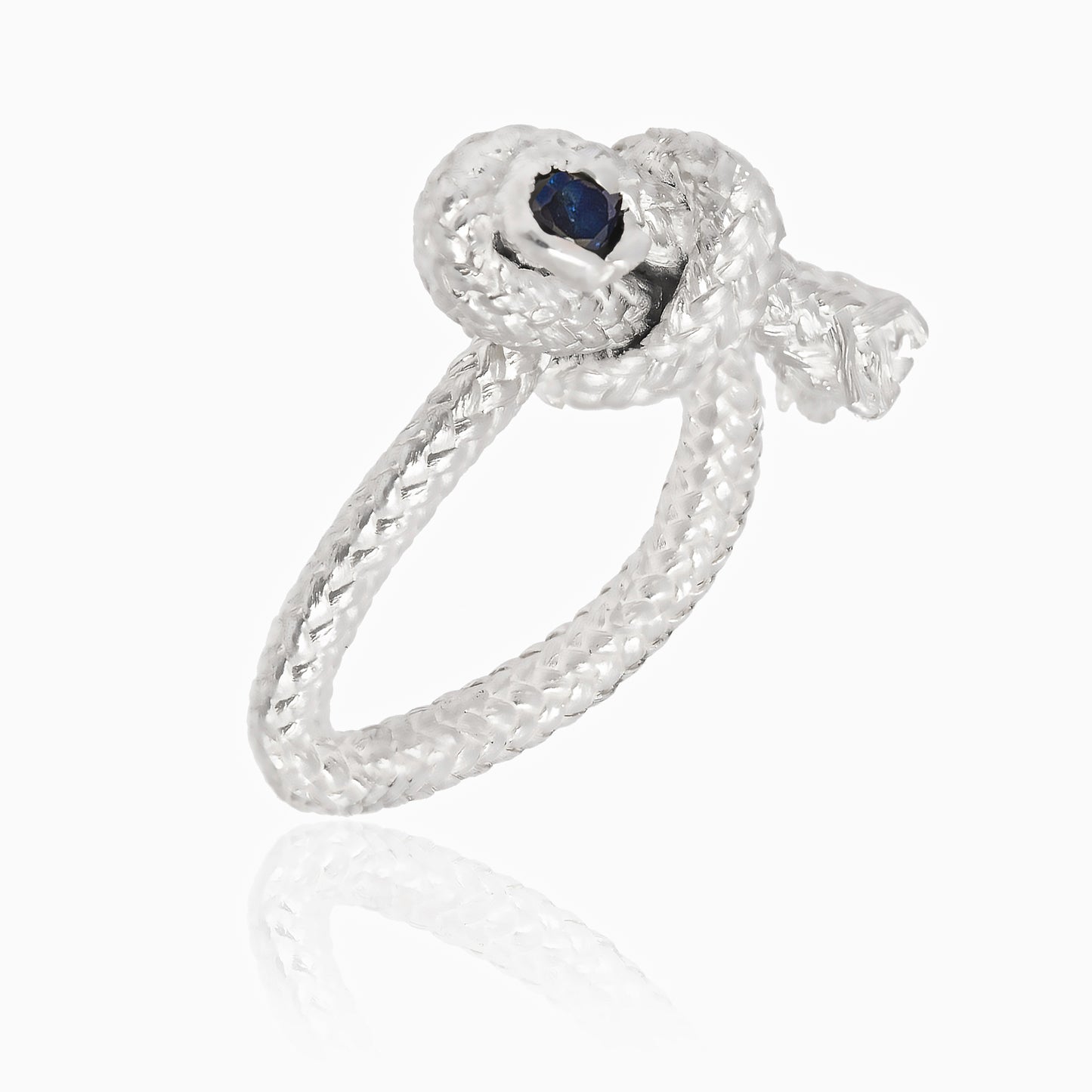 Silver ring knot with blue sapphire