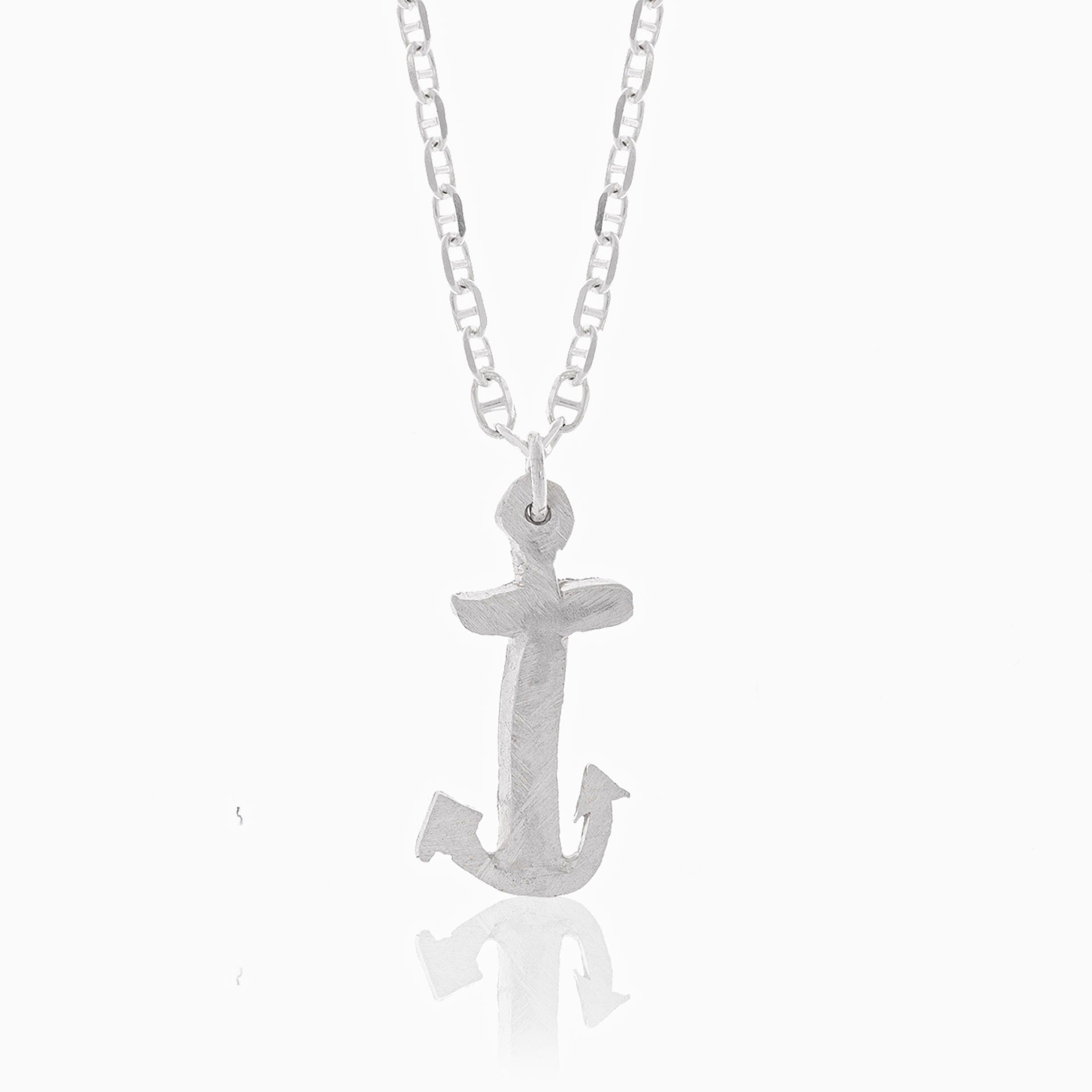 Underwater Anchor, a nautical-inspired jewel, is a sterling silver anchor pendant on a delicate chain that captures the essence of maritime culture, showcased against a white background.